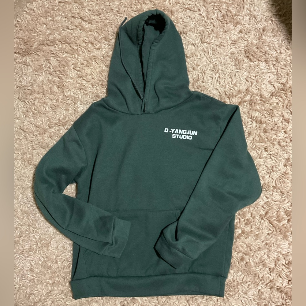 Hello! I am selling a hoodie with thick material and white letters on the front.